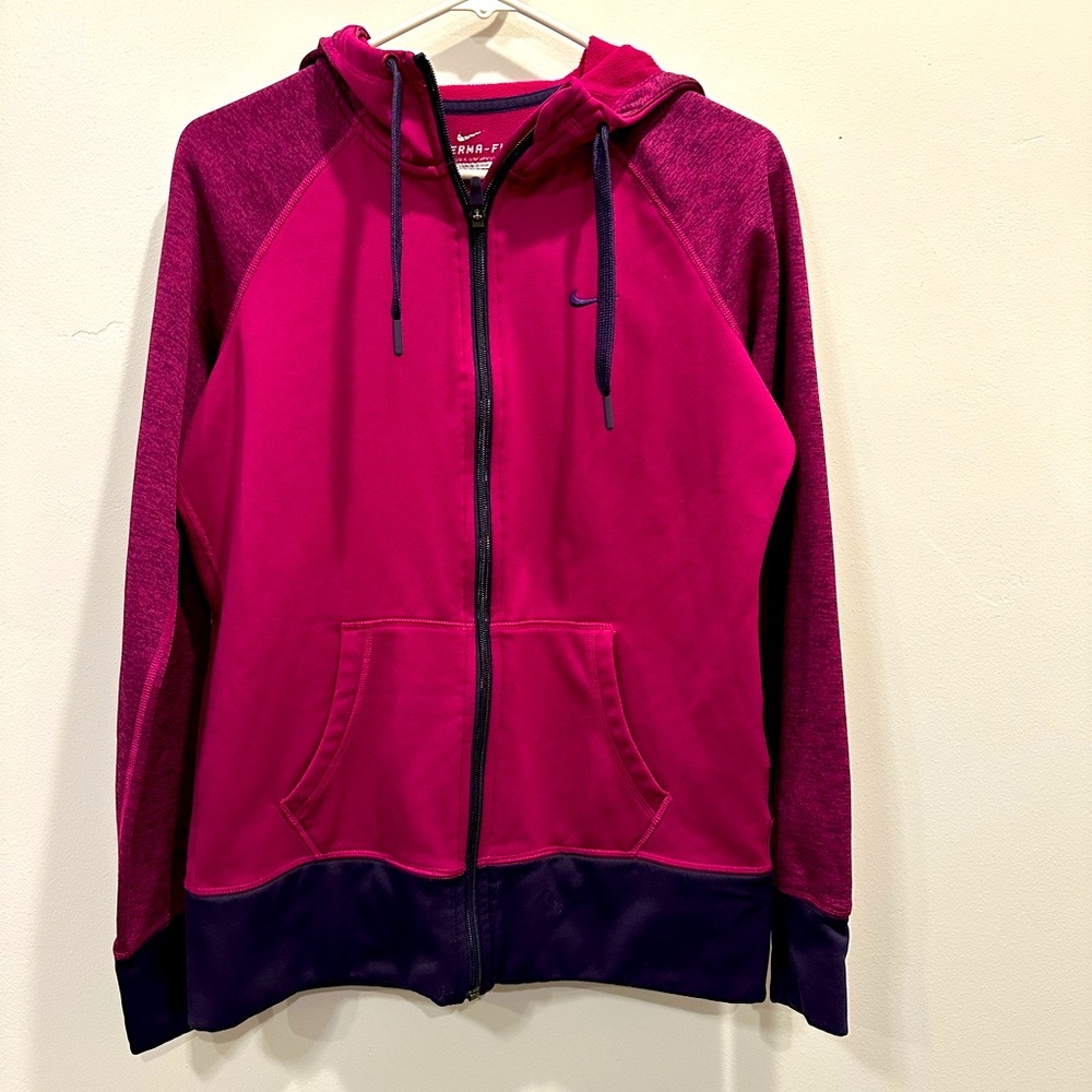 Nike. Long sleeve hoodie zip down therma fit. Pink and purple. Size M.